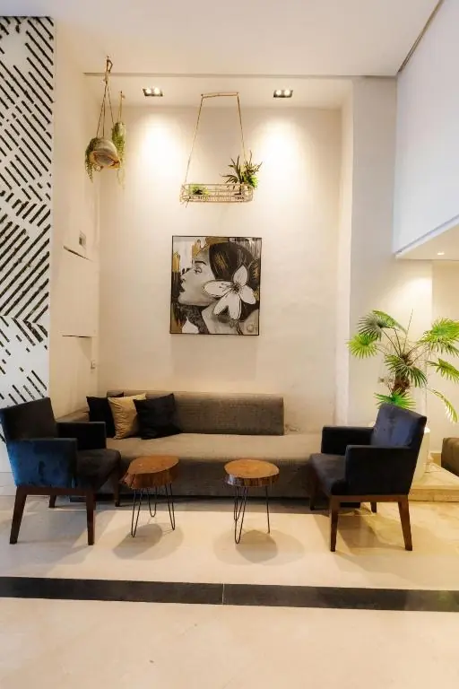 Lobby seating and wall art at Windsor Hotel City Center
